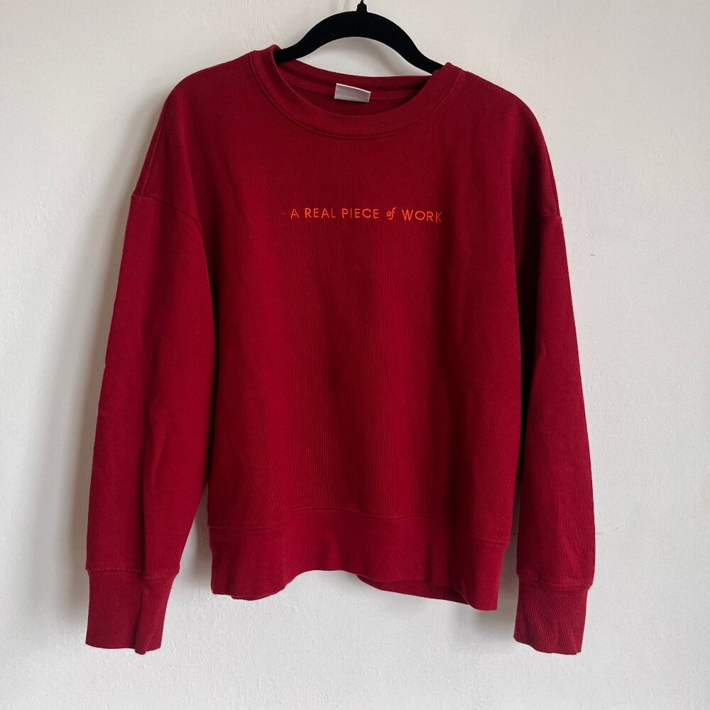 The Wing “A Real Piece of Work” Red Crewneck Sweatshirt | Size M